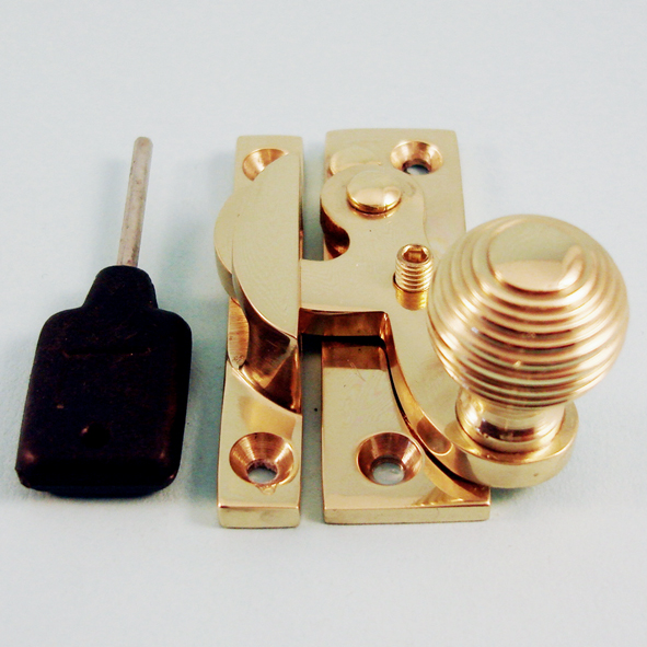 THD113L/PB • Locking • Polished Brass • Locking Clo Reeded Knob Sash Fastener